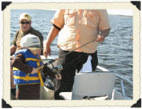 Andrew with a catfish he caught